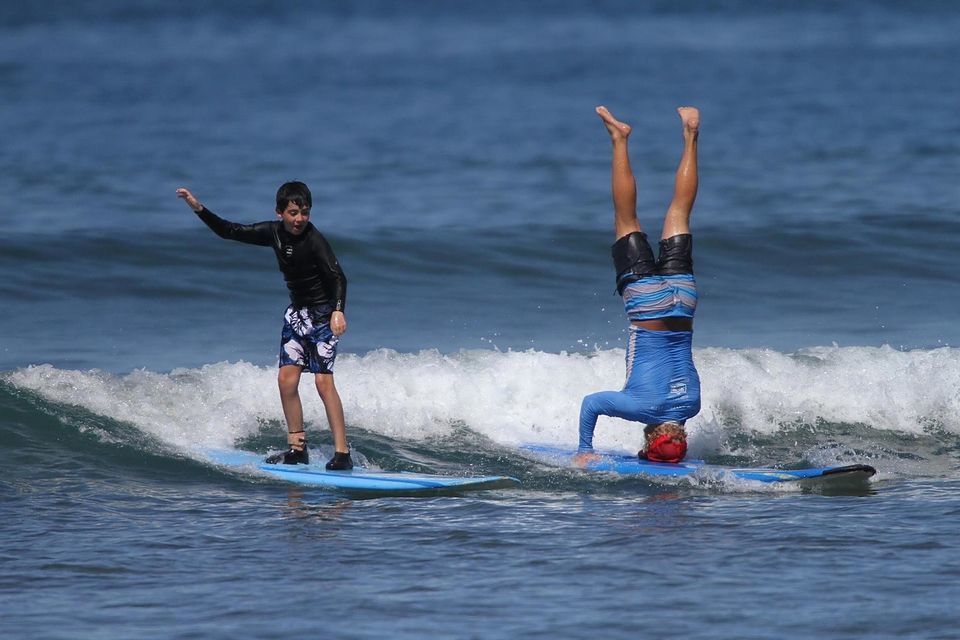 Surfing instructors in the waves - more jobs on the road